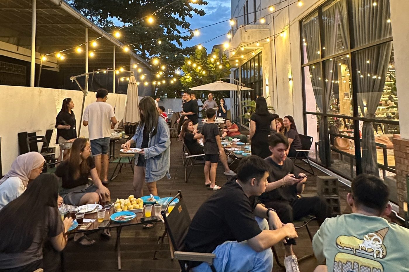 Sandbox coworking members at a BBQ networking night in Bandar Sunway