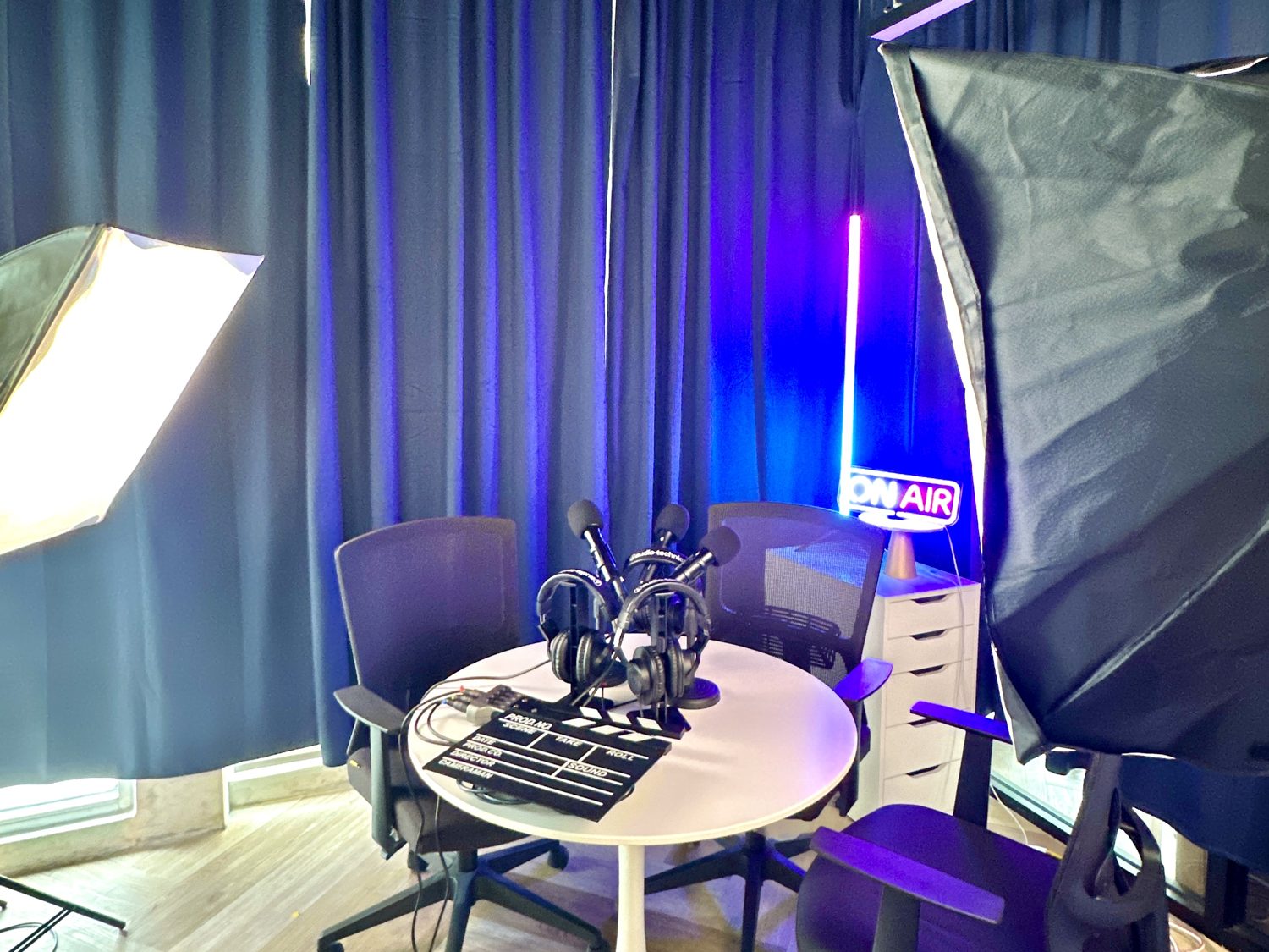 Podcast studio rental in Kuala Lumpur with ON AIR sign, softbox lighting and mics at Sandbox Space